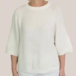 Pull qui tient chaud, coloris beige avec des manches 3/4, porte