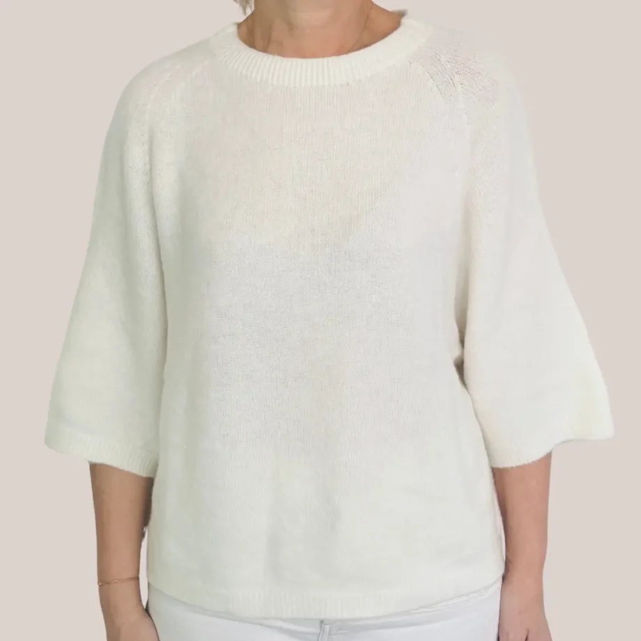 Pull qui tient chaud, coloris beige avec des manches 3/4, porte